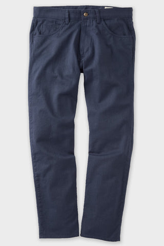 A pair of dark navy blue athletic-fit jeans 