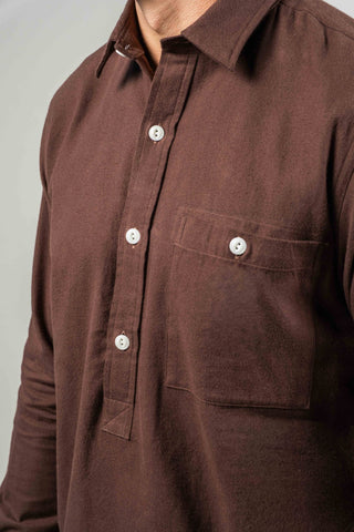 Close-up of the brushed cotton half placket, white buttons and chest pocket