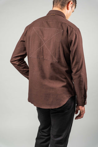 Three-quarter back view on model, showing the X-stitched back panel